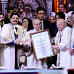 Dr M S Swaminathan receiving honor from president