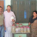 Sharad Mohan with farmers sugarcane