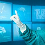 Doctors working on modern virtual screen